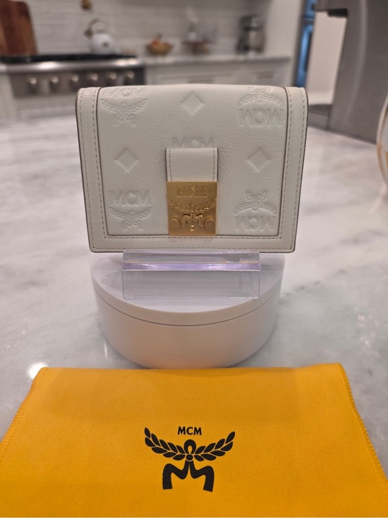 MCM Handbags - NWT MCM Off White Embossed Leather Bifold Wallet with Gold Plaque
